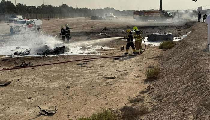 Firefighters carry out a rescue operation after Indian jet, Tejas, crashed during the Dubai Airshow on November 21, 2025. — Report