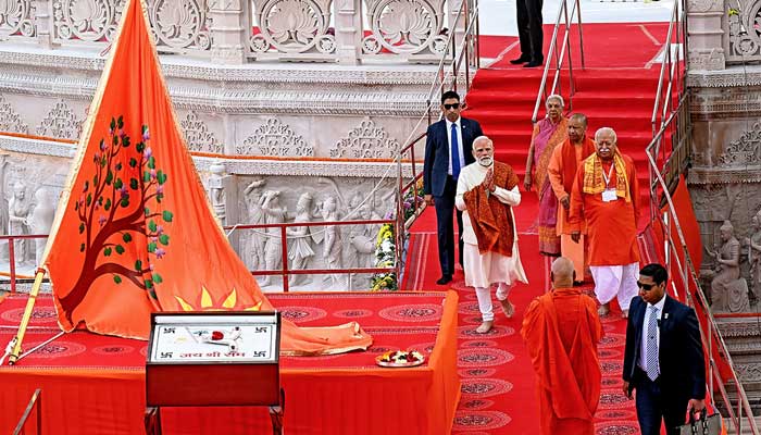 Indian PM Narendra Modi, along with RSS chief Mohan Bhagwat participating in a flag-hoisting ceremony to mark the completion of the Ram temple´s construction in Ayodhya on November 25, 2025. — AFP