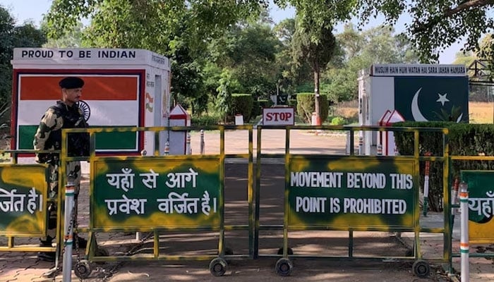 An Indian Border Security Force (BSF) soldier stands guard at the international border with Pakistan in Suchetgarh near Jammu on  November 2, 2022. — Reuters