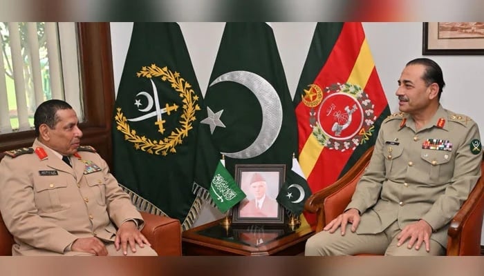Commander of the Royal Saudi Land Forces Lieutenant General Fahd bin Abdullah Al-Mutair (left) calls on Field Marshal and CDF Asim Munir at the General Headquarters in Rawalpindi on November 27, 2023. — ISPR