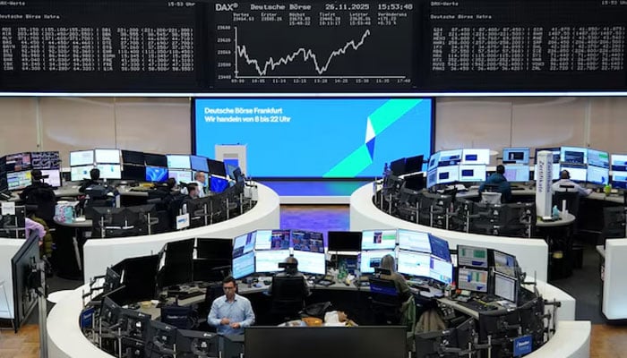 A graph of the German share price index DAX is displayed at the stock exchange in Frankfurt, Germany, November 26, 2025.—Reuters