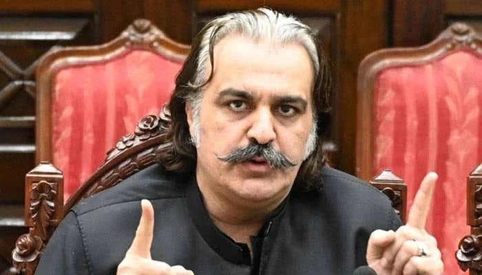 PTI Leader Ali Amin Khan Gandapur gestures as he speaks at a presser in Peshawar on April 22, 2024. — X/@GovernmentKP