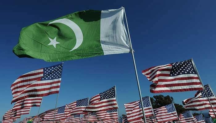 The flag of Pakistan flies among American flags. — AFP/File