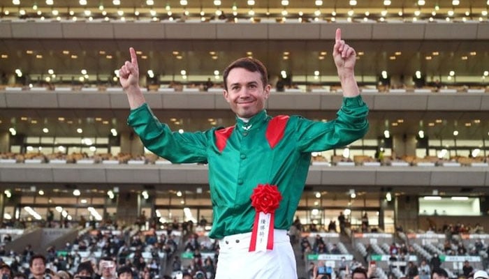 Mickael Barzalona celebrates a thrilling Japan Cup triumph with European star Calandagan. —AFP/File