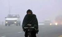 Smog grips City; dry forecast