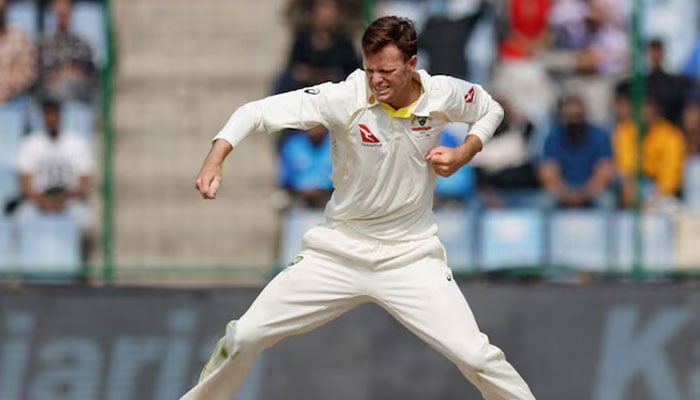 Australias Matthew Kuhnemann celebrates after taking the wicket of Indias Virat Kohli. — Reuters/File