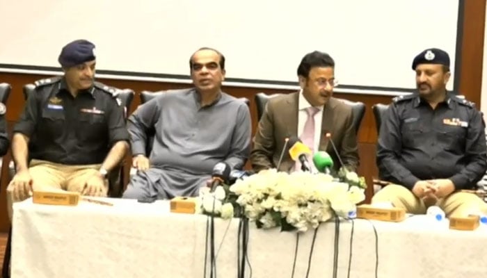 Sindh Home Minister Ziaul Hassan Lanjar (centre right), along with Excise Minister Mukesh Kumar Chawla (centre left), Additional IG Karachi Javed Alam Odho (right) and senior police officials speak in a media briefing at the Karachi Police Office (KPO) on December 1, 2025. — Screengrab via Facebook@sindhinfodepart