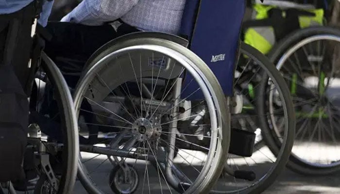 A representational image showing a person sitting in a wheelchair. — AFP/File