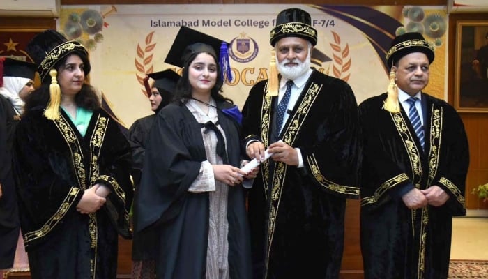Prof. Dr. Muhammad Niaz Ahmed, Vice Chancellor of Quaid-e-Azam University awarding a degree to a successful students in the first convocation of Islamabad Model College for Girls (IMCG) F-7/4 on December 2, 2025. — Facebook@imcgf74official