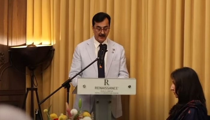 Syed Yousaf Raza Gilani, Chairman of the Senate, on Saturday addresses a gathering of the Malaysian business community at a dinner hosted in his honour.—Screengrab via Facebook@Pakistansenate