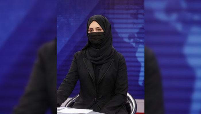 This representational image shows a woman anchor seen in a newsroom. — Reuters/File