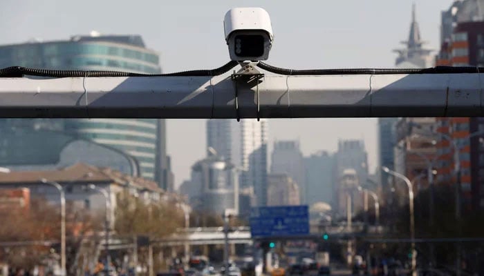 This representational image shows a security surveillance camera overlooking a street. — Reuters/File