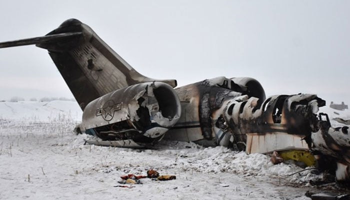 In this representational photograph, the wreckage of a US Bombardier E-11A jet is seen after it crashed in the mountainous territory of Deh Yak district in Ghazni province on Jan. 27, 2020. —  AFP