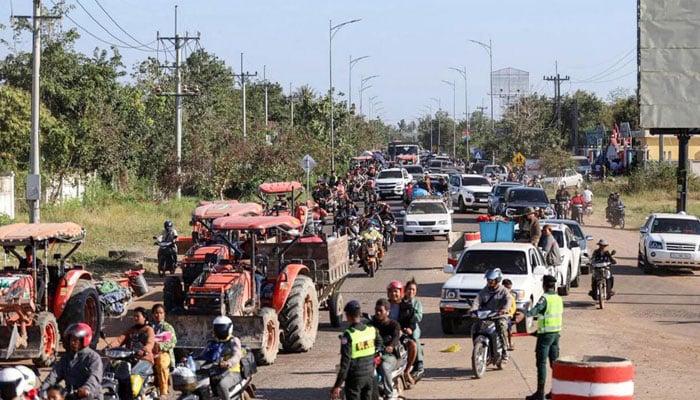Tens of thousands of people have evacuated from border regions since the fresh fighting began on Sunday . —AFP