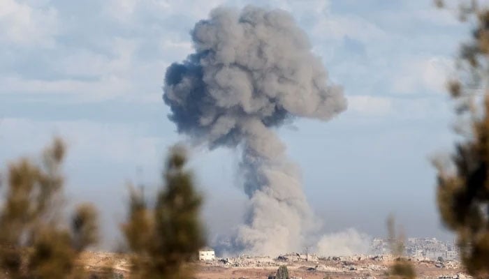 Smoke rises from an explosion in Gaza, as seen from southern Israel, October 7, 2025. — Reuters