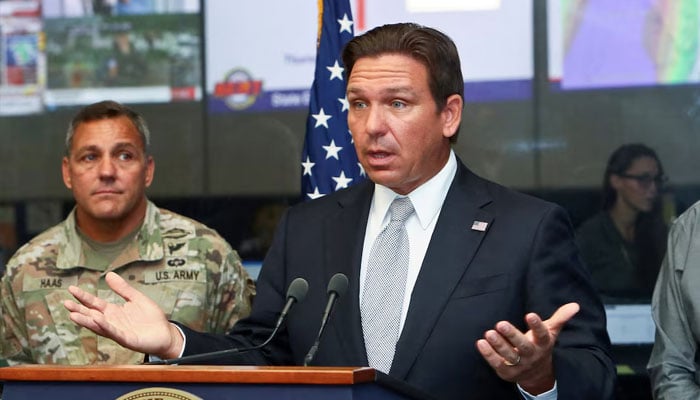 Florida Governor Ron DeSantis speaks about Hurricane Helene as Adjutant General of Florida Major General John Haas looks on during a press briefing at the Emergency Operations Center in Tallahassee, Florida, US, September 26, 2024.—Reuters