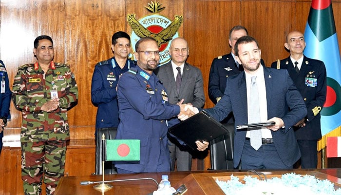 The Bangladesh Air Force (BAF) and Leonardo S.p.A., an Italian multinational company, officials shake hands after signing a Letter of Intent (LOI) at BAF headquarters in Dhaka on December 9, 2025. —Facebook@BDAirForceOfficial