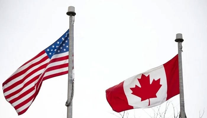 US and Canada flags. —AFP/File