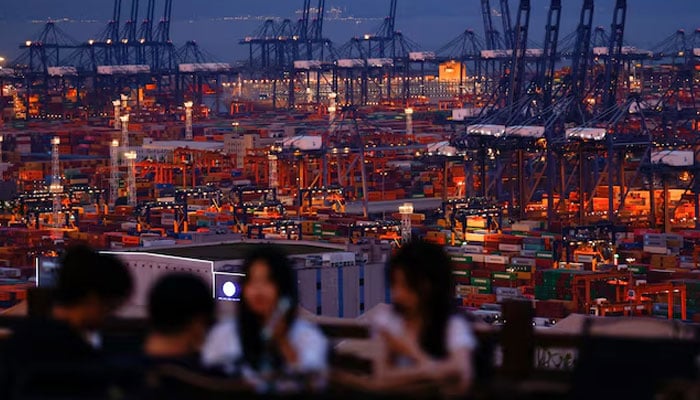 Representational image shows people enjoying their time on a hill overlooking Yantian port in Shenzhen, Guangdong province, China May 9, 2025. — Reuters