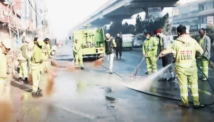 LWMCs teams are washing the Ferozepur Road on December 11, 2025. — Screengrab via Facebook@LWMC1139