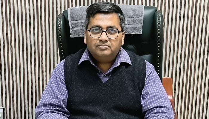 Deputy Director Property & Land Lahore, Wasif Ikram, look on in this image released on December 11, 2025. — Facebook@prds.lhr