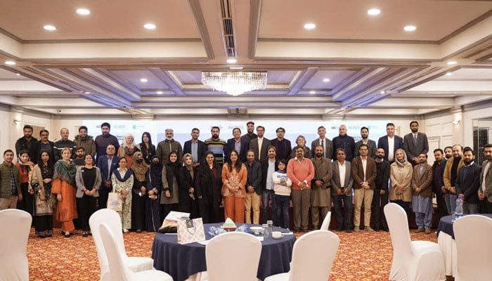 Participants pose for a group photo at the National Conference on Climate Disinformation on December 11, 2025. — Facebook@IRADAPK