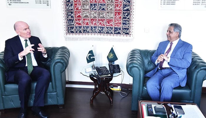 Federal Minister for Human Rights Azam Nazeer Tarar (right) exchanges views with Australian High Commissioner Timothy Kane during a meeting on December 10, 2025. —  APP