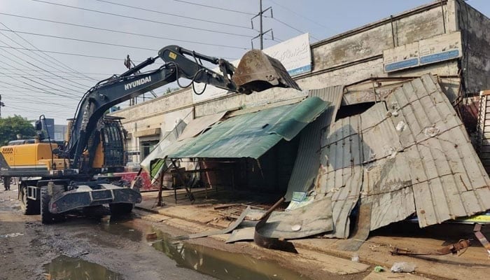 This representational image shows district administration machinery removing the illegal installations in the city on September 21, 2023. — Facebook@LahoreDevelopmentAuthority