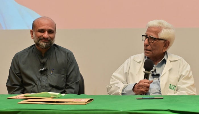 SIUT founder Dr Adib Rizvi (right) and Edhi Foundation Chief Executive Officer Faisal Edhi (left) are seen after signing an agreement in Karachi on December 11, 2025. — Facebook@siutpakistan