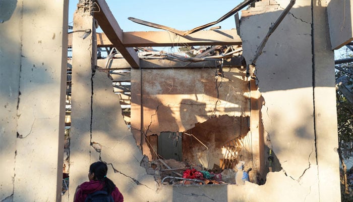 Broken walls of hospital in Myanmar after air strike. —AFP