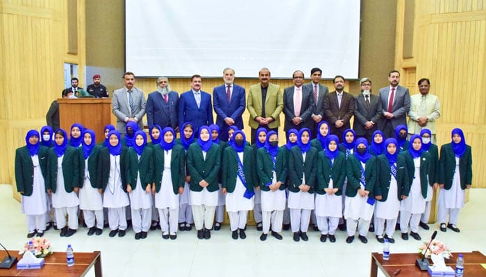 Chairman NAB Lt. Gen (R) Nazir Ahmed, CEO Pakistan Sweet Home Zamrad Khan (H.I), Deputy Chairman NAB Sohail Nasir, and other dignitaries in a group photo with children of Pakistan Sweet Home, who visited NAB (Headquarters) on December 11, 2025. — APP