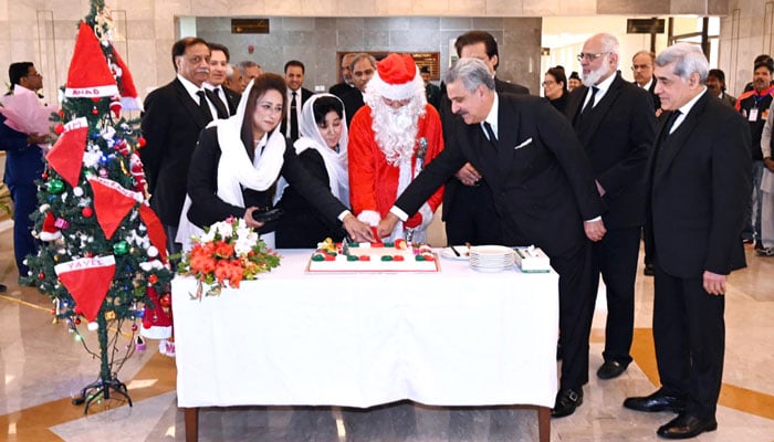 Chief Justice of Pakistan Justice Yahya Afridi, judges of the Supreme Court of Pakistan, cutting a festive cake at a special ceremony held at the Supreme Court of Pakistan on December 11, 2025. — APP
