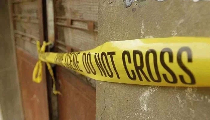 This representational image shows a police tape tied to the gate. — AFP/File