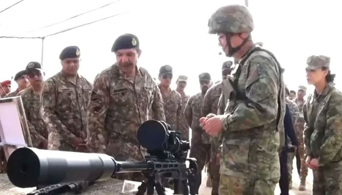 This image shows Pakistan Army and People’s Liberation Army (PLA) of China officials attending the opening ceremony of joint military exercise Warrior-IX at the National Counter Terrorism Centre (NCTC), Pabbi, in Nowshera. — ISPR