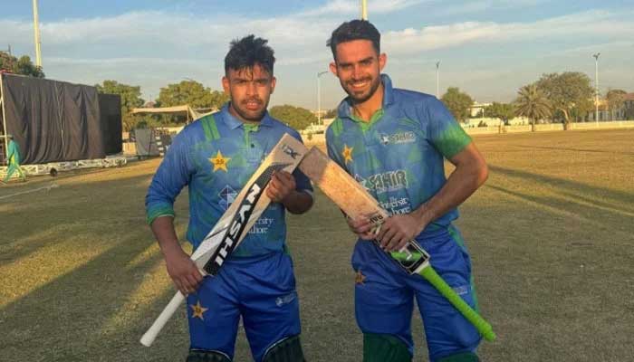 Sahir Associates Usman Khan (left) and Mohammad Faiq pose for a picture after winning their Presidents Cup Grade-I match against Ghani Glass at the Oval Academy in Karachi on December 12, 2025. — PCB