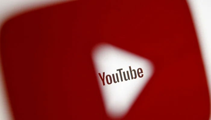 A 3D-printed YouTube icon is seen in front of a displayed YouTube logo in this illustration taken October 25, 2017. — Reuters