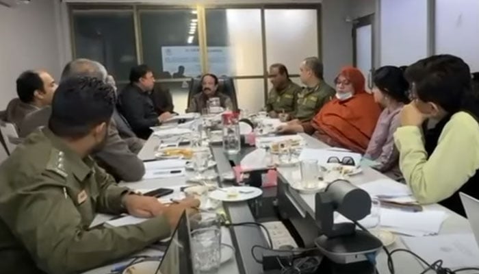 Chief Minister’s Advisor for Rehabilitation Gyanchand Essrani chairs the fourth meeting of the Sindh Emergency Council at the PDMA headquarters on December 12, 2025. — Screengrab via Facebook@Giyan Chand Essarani