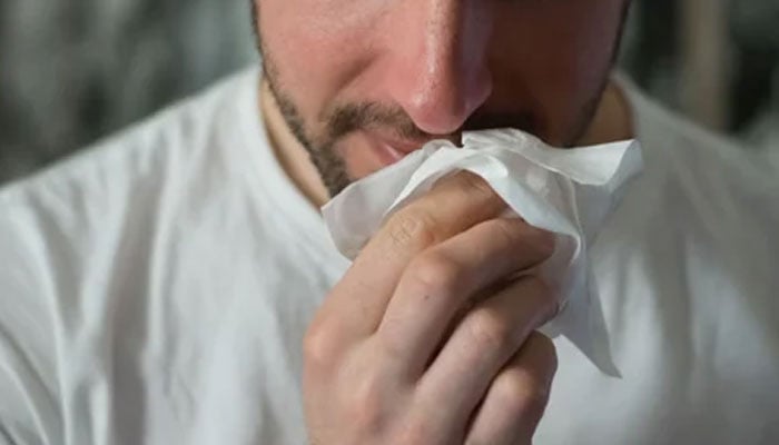 This representational image shows a man afflicted with the flu. — Unsplash/File