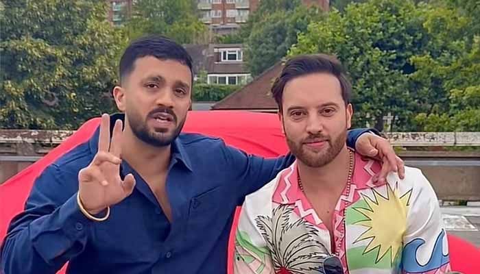 British-Pakistani social media influencer and TikToker Zareq Nazir (right) with YouTuber Rajab Butt can be seen in this undated screengrab taken from a TikTok video. — Reporter/Murtaza Ali Shah/File