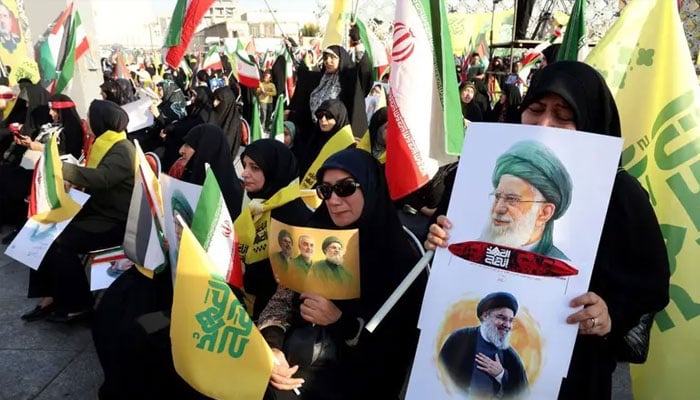 Iranians attend a ceremony to mark the first anniversary of the death of Hezbollah leader Hassan Nasrallah, in Tehran, on October 2, 2025. —AFP