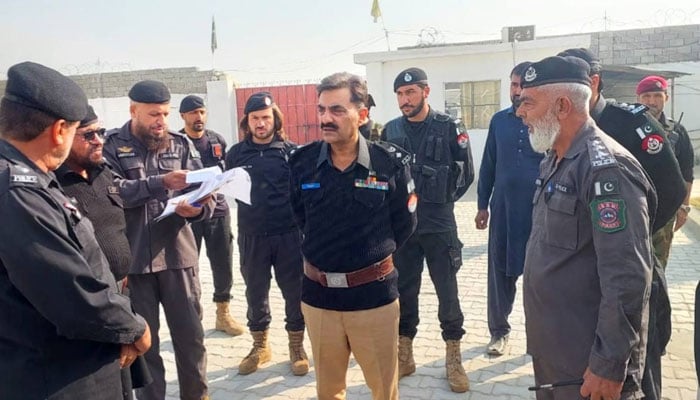 Khyber District Police Officer (DPO) Waqar Ahmad (centre) interacts with police personnel on December 11, 2025. — Facebook@khyberpoliceofficial