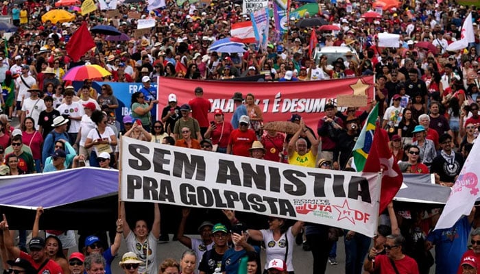 Tens of thousands of people marching in cities across Brazil. —AFP/File