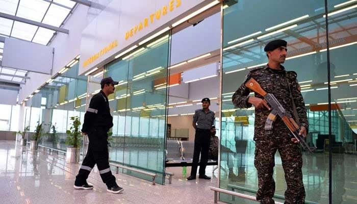 Officials of the Airport Security Force (ASF) stand guard at the airport. — AFP/File