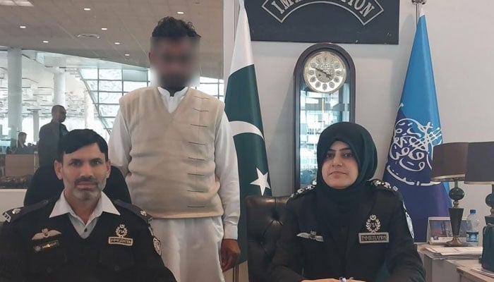 FIA officials pictured with the passenger, Abrar Ahmed, on December 17, 2025. — Facebook@FIAAgencyOfficial