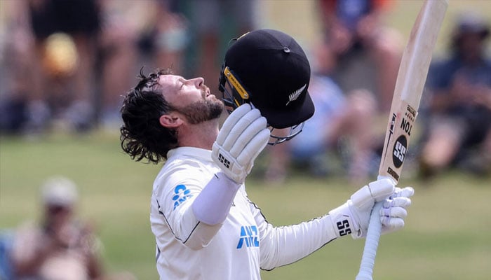 New Zealands Devon Conway celebrates his century. —AFP