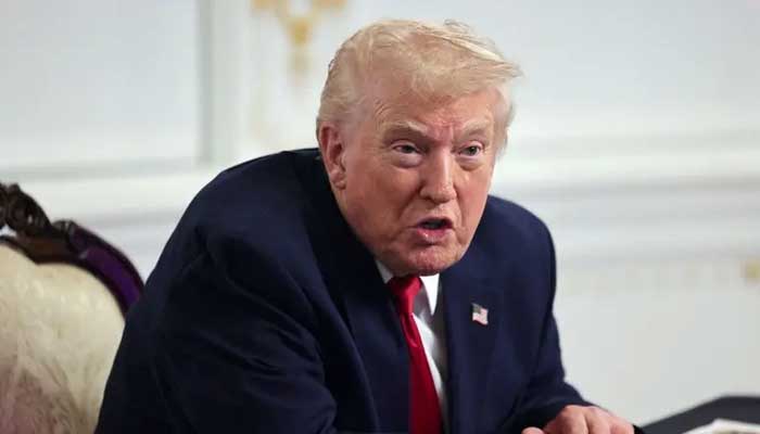 US President Donald Trump speaks with members of the media following a call with military service members, on Thanksgiving, in Palm Beach, Florida, on November 27, 2025. — Reuters