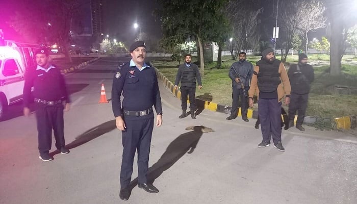 Islamabad police can be seen at a security checkpoint in the federal capital. — X@ICT_Police/File