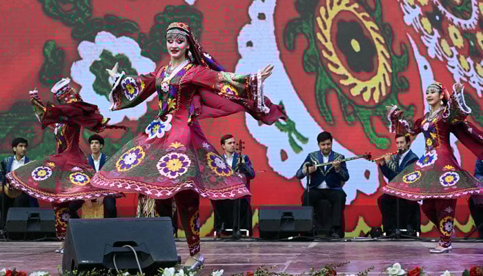 Artists from Tajikistan perform traditional dances to cultural music during the joint cultural day of the Pakistan-Tajikistan Cultural Festival at Lok Virsa on December 21, 2025. — APP