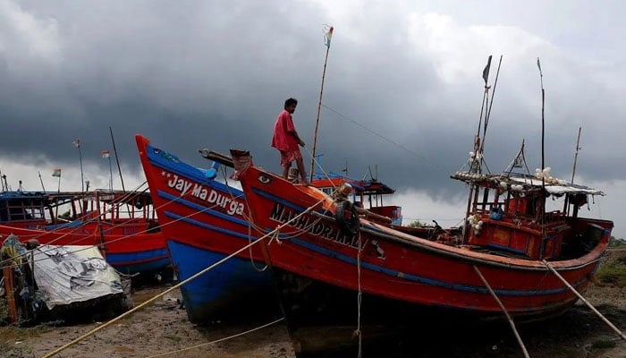 A representational image of a  fisherman ties his boat on a shore ahead of Cyclone Yaas in Digha in Purba Medinipur district in the eastern state of West Bengal, India, on May 25, 2021. — Reuters