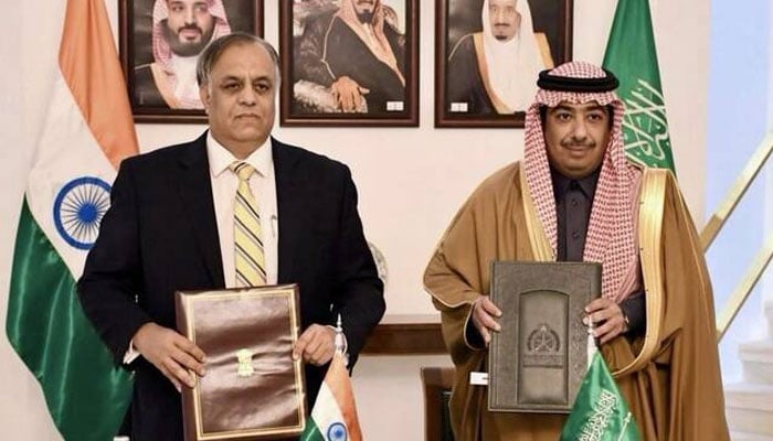 Indian Ambassador Suhel Ajaz Khan and Deputy Minister for Protocol Affairs MoFA Abdulmajeed Alsmari signed the bilateral Visa Waiver Agreement in Riyadh. —Indian Embassy